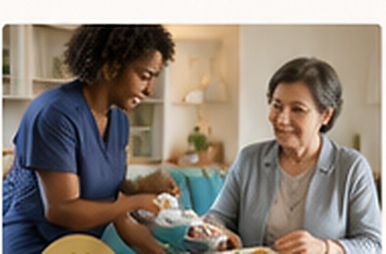 Caregiver assisting an older woman